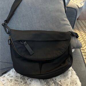 Lululemon All Night Festival in black with gold accents